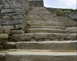 It has over 150 buildings consisting of baths, houses, temples and sanctuaries. Also, it has over 100 separate flights of stairs, most of which were c